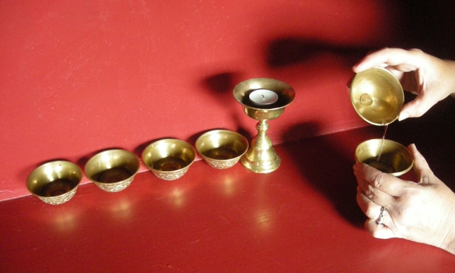 placing the offering bowls